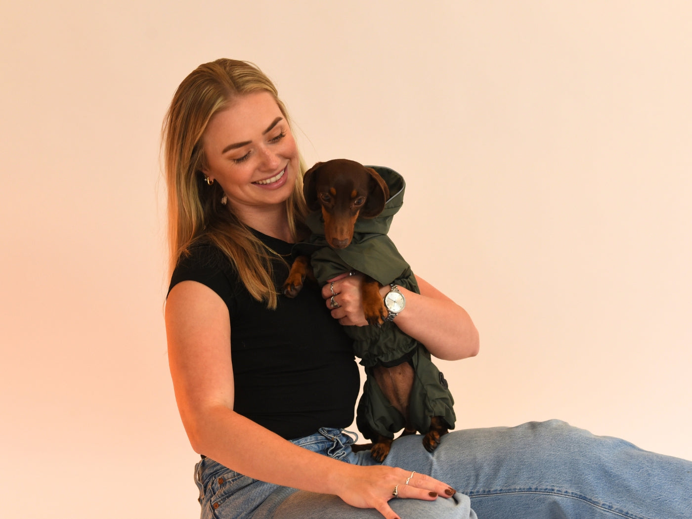 Sausage wearing the Khaki Raincoat with Emily.